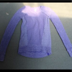 A purple Ivivva sweater